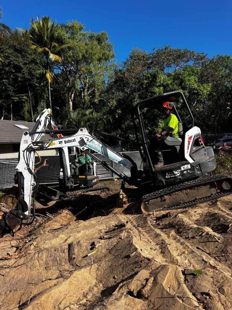 Excavator working on a cleared site