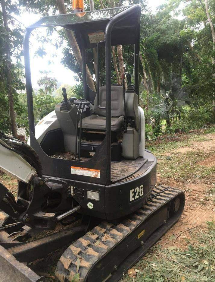 Excavator on a bush track clearing job